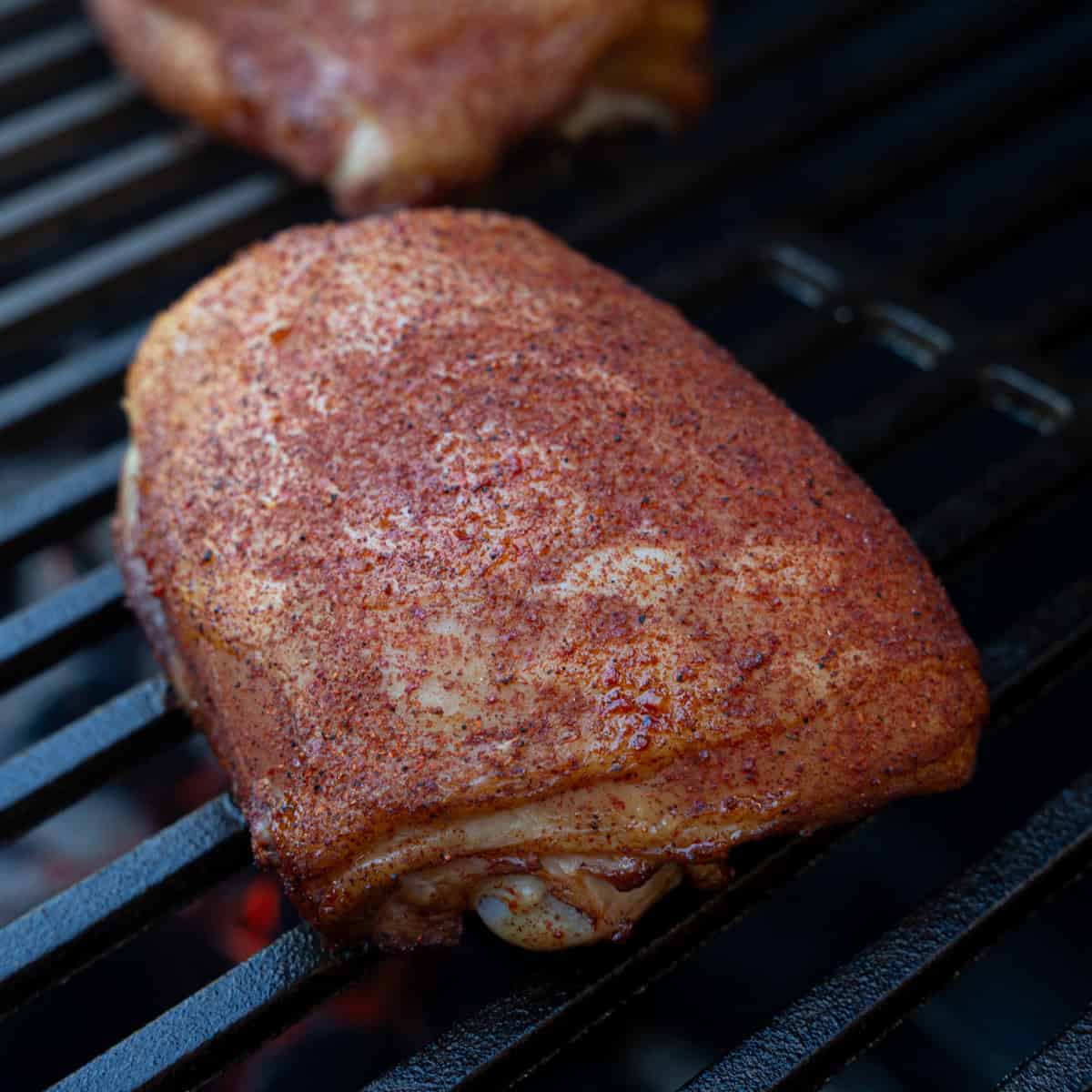 Chicken Thighs with Apple-Cinnamon Glaze Being Grilled