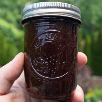 Homemade Cherry Molasses BBQ Sauce after being properly stored in a mason jar