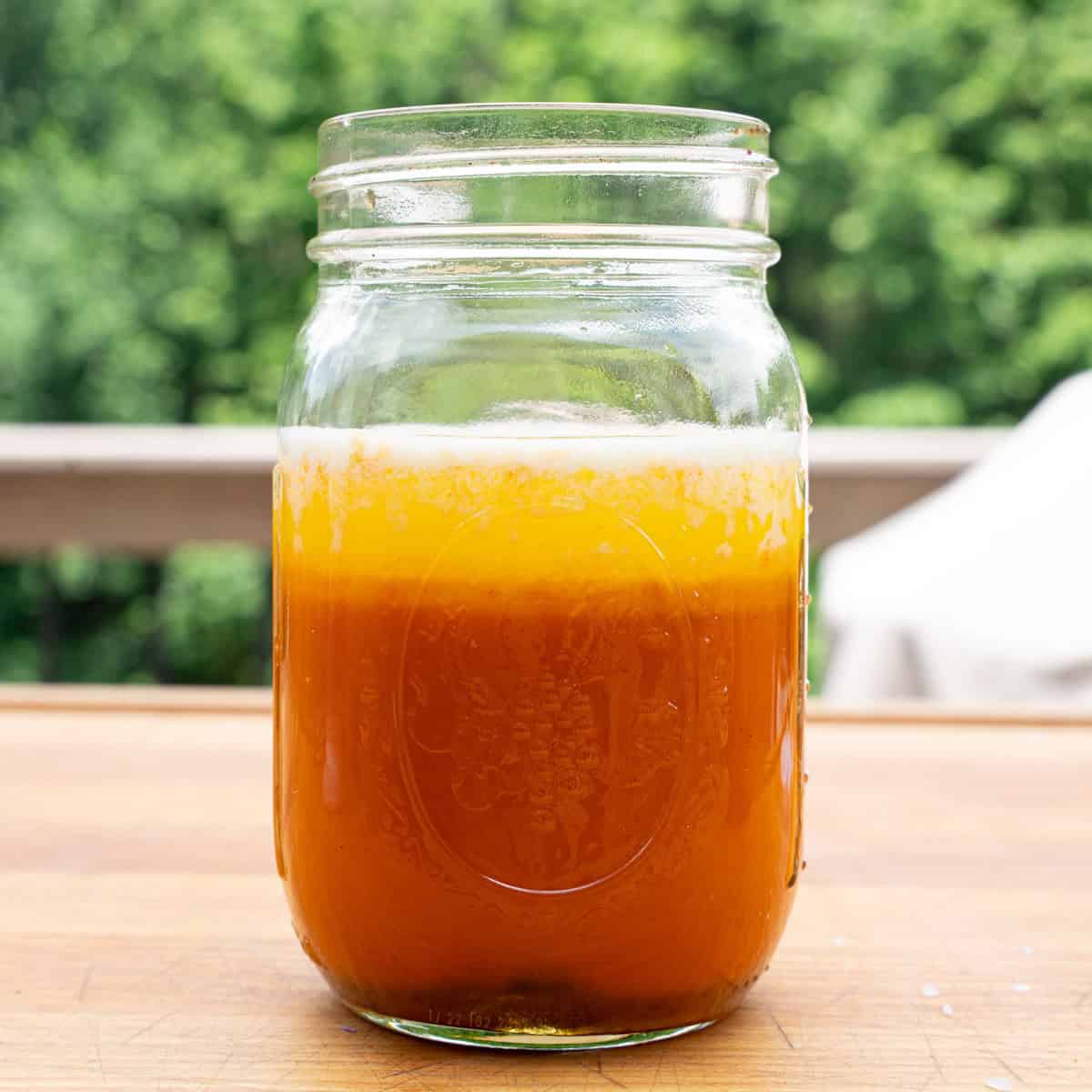 All of the Ingredients in a Mason Jar for the Hot Garlic Sauce