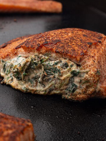 Spinach Stuffed Salmon made on the griddle for my recipe blog post, in which I include how to freeze salmon when covering the storage process.
