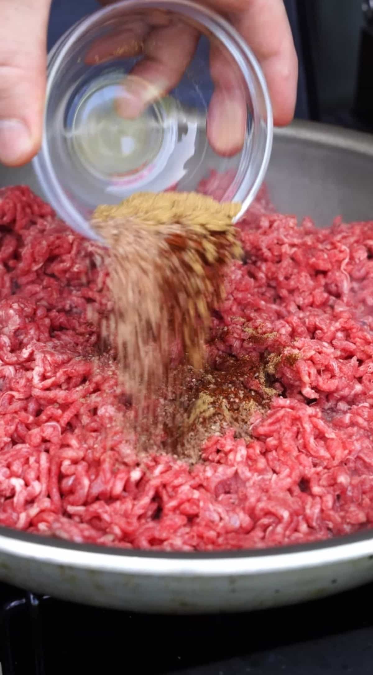 Seasoning the ground beef to start the chili base