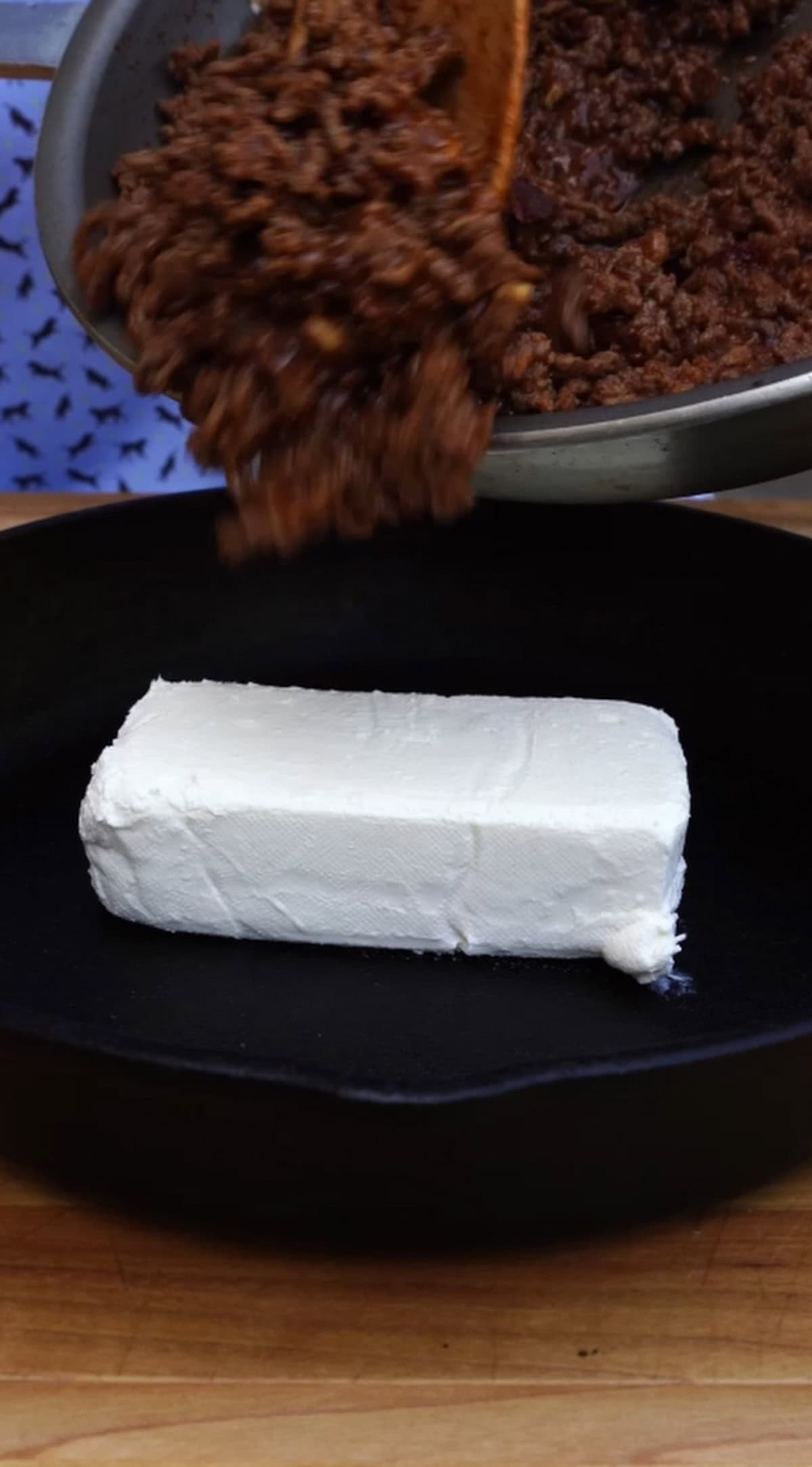Adding cream cheese into a skillet as an integral part of the dip