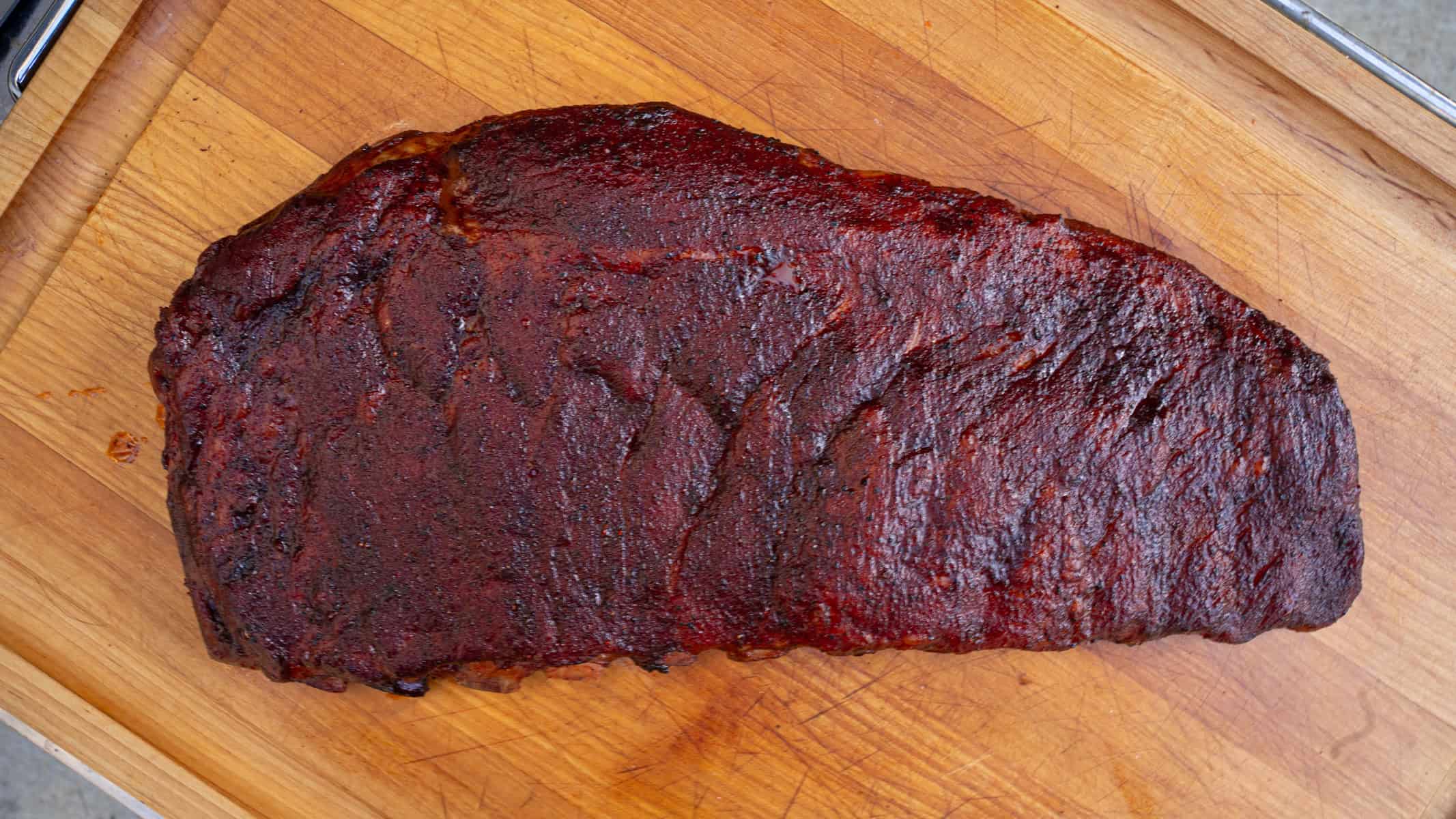 Ribs that have just been pulled off of the smoker after 6 hours cooking using the 3 2 1 ribs method