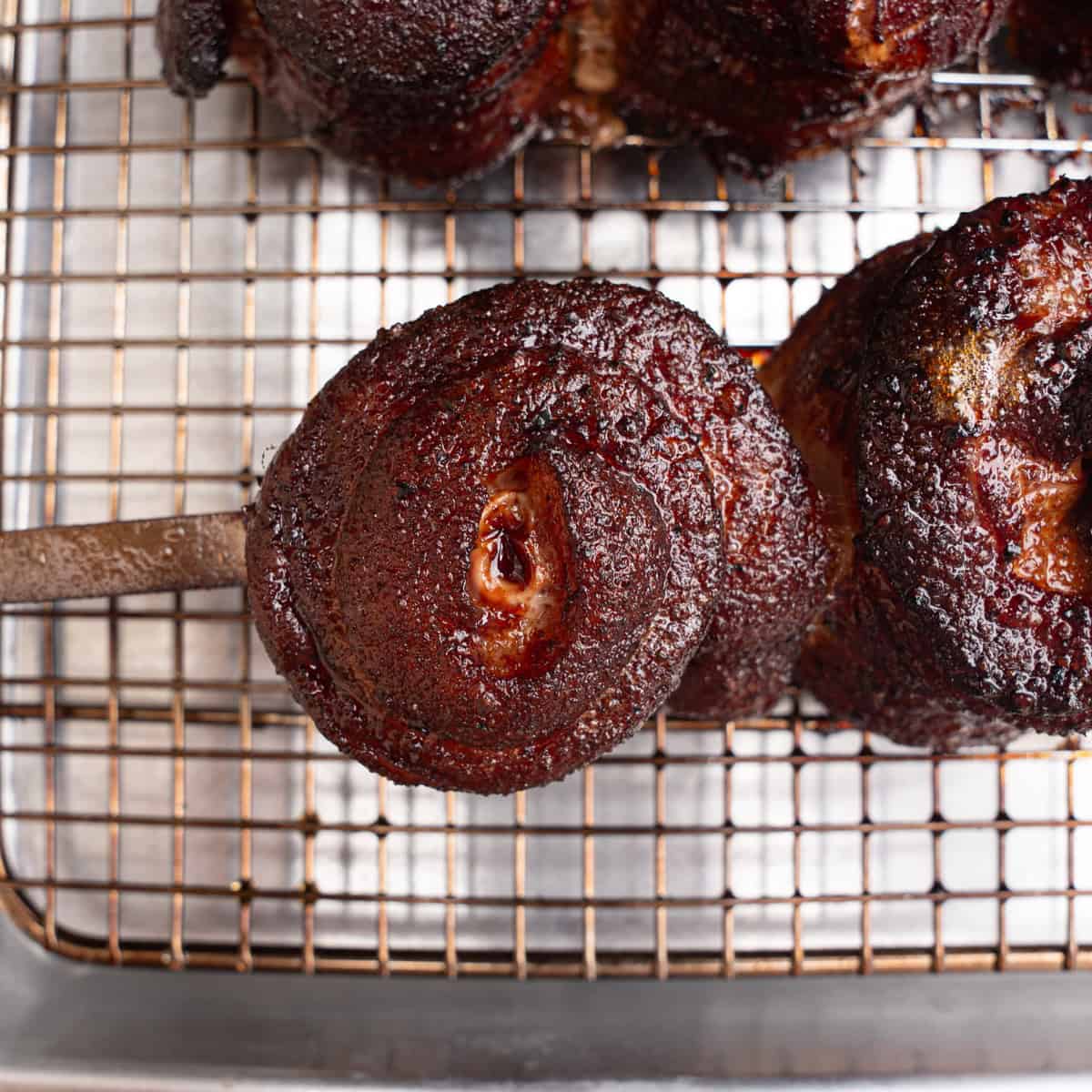 Smoked Pork Belly Lollipops before being glazed with hot honey BBQ sauce