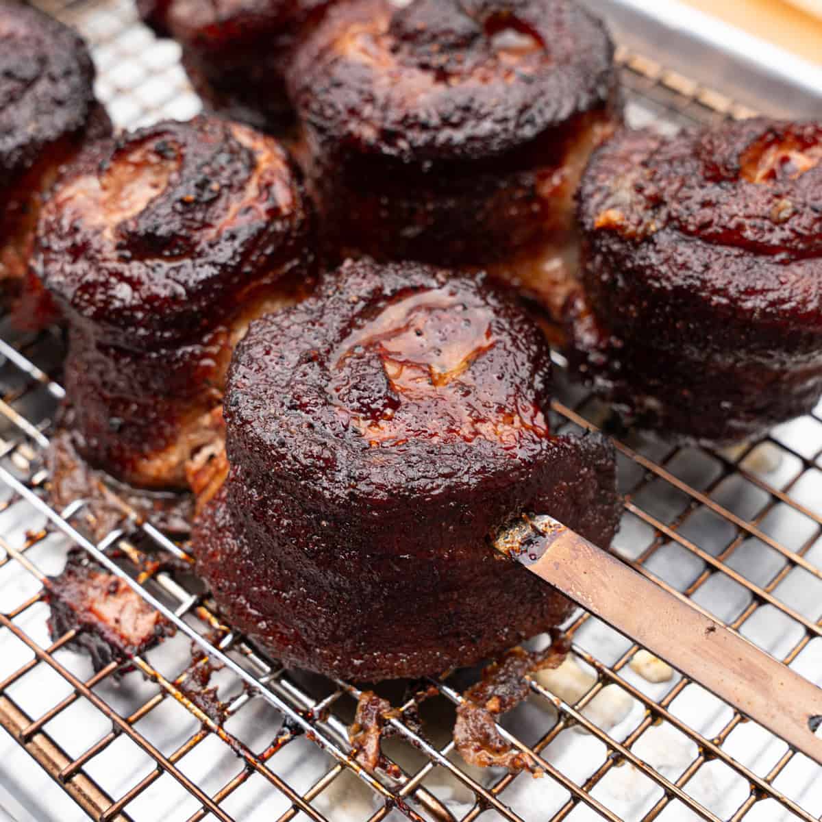 Smoked Pork Belly Lollipops before being glazed with hot honey BBQ sauce