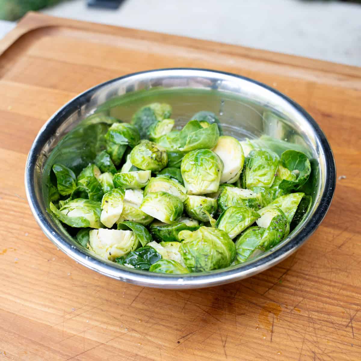 Seasoned Brussels Sprouts in a prep bowl