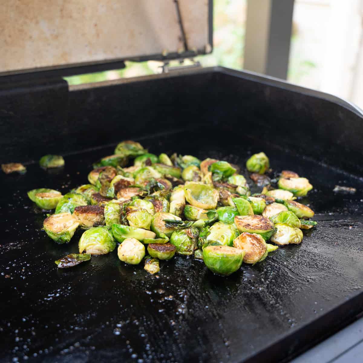 Searing Brussels Sprouts on the griddle