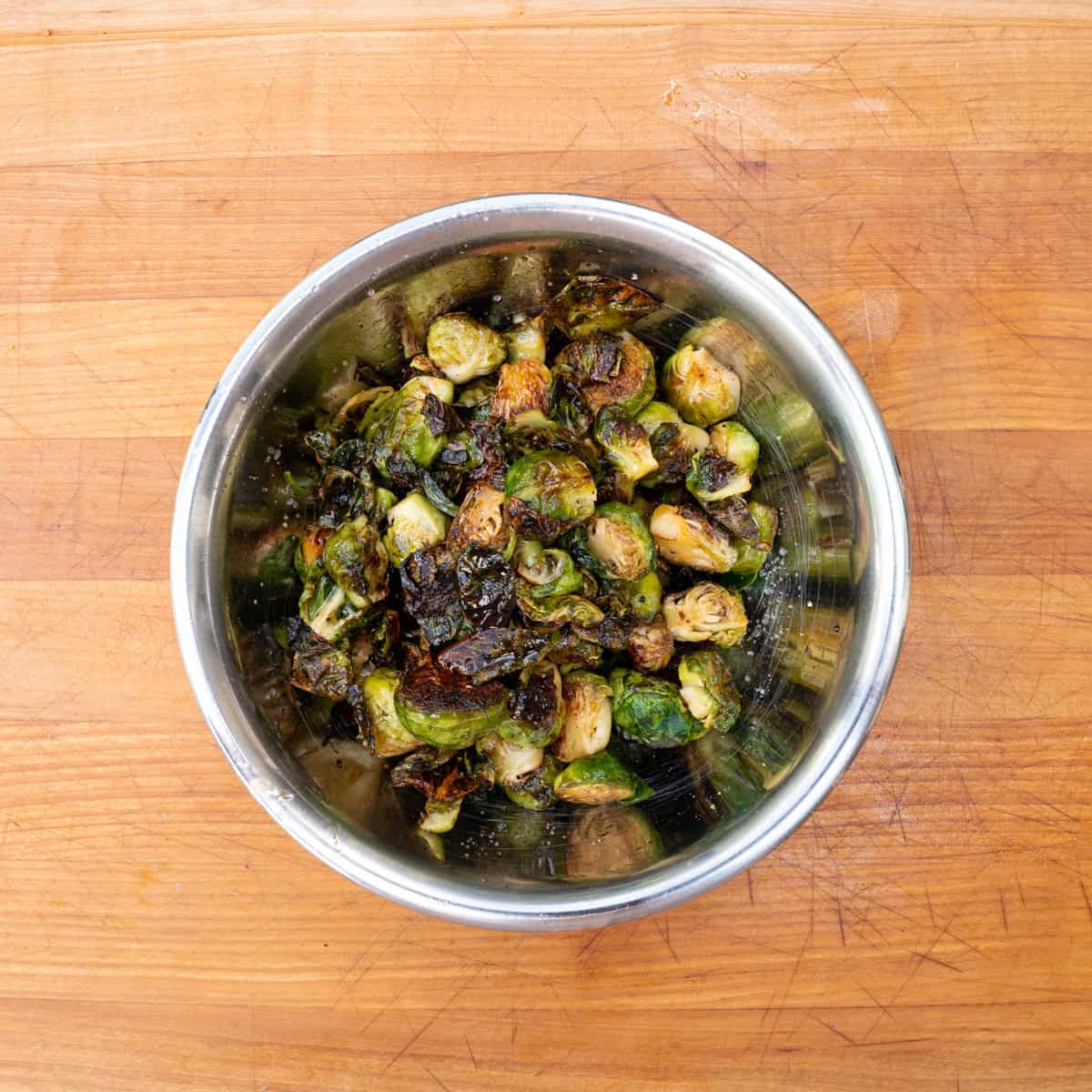 Seared Brussels Sprouts topped seasoned with hot honey