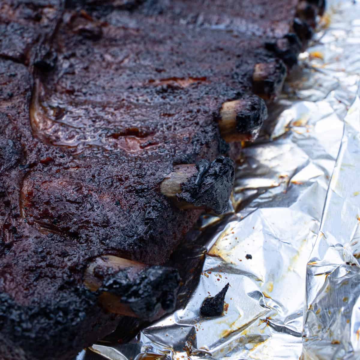 Checking for ½ inch bone protrusion of the ribs to know they are becoming tender