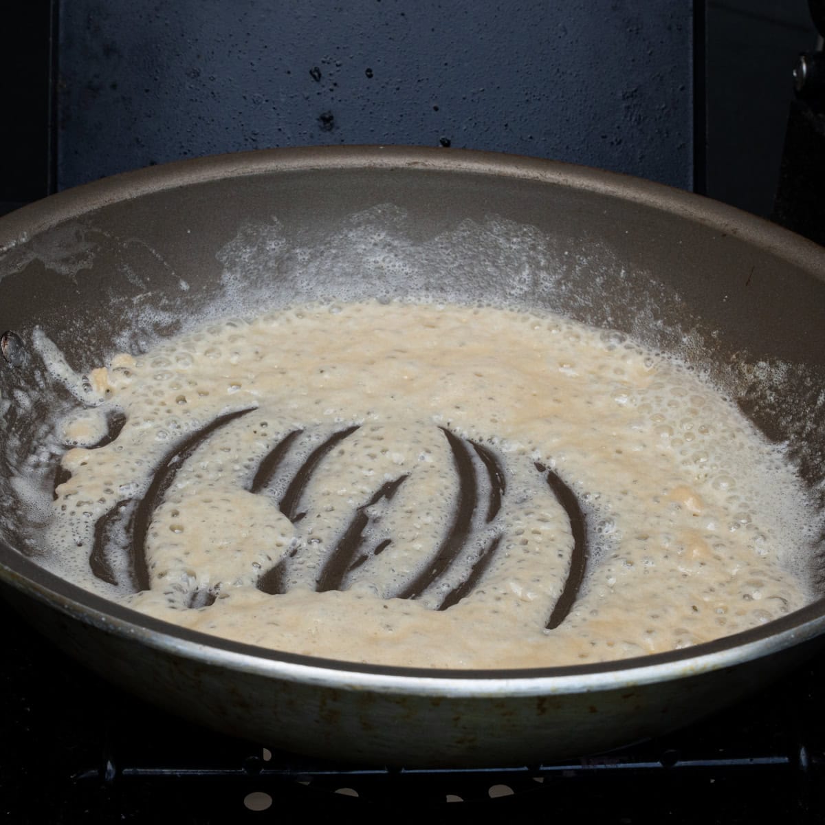 Making the light roux for the cream sauce