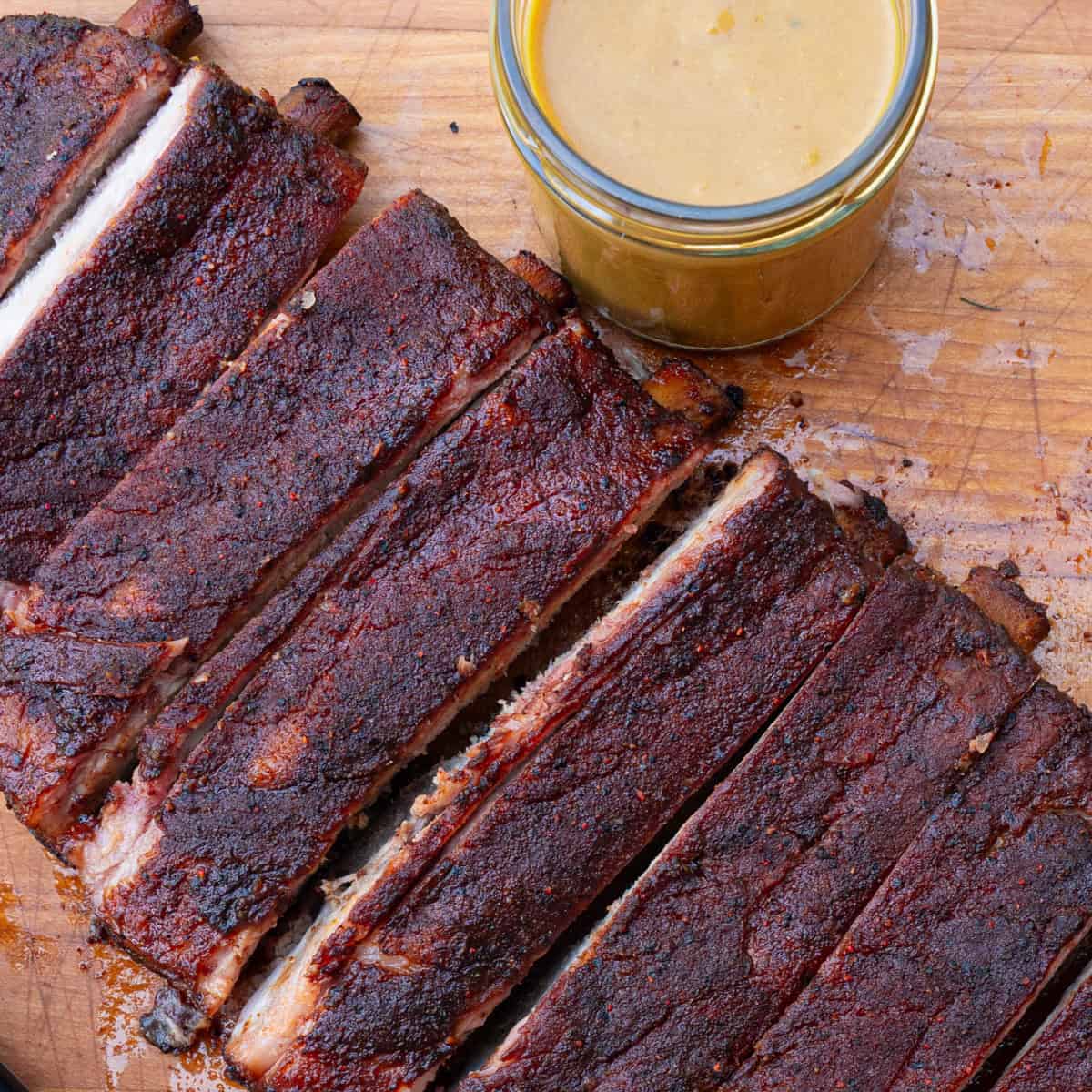 Finished product: Smoked ribs freshly sliced using the 2 1 1 method