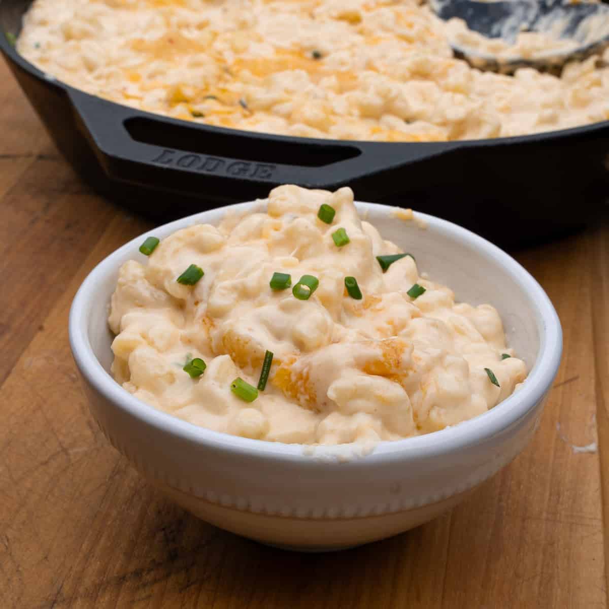 Serving a bowl of the creamy southern Mac and cheese with gouda cheese