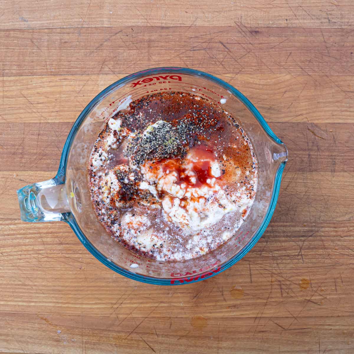Mixing wet ingredients for the Alabama white sauce