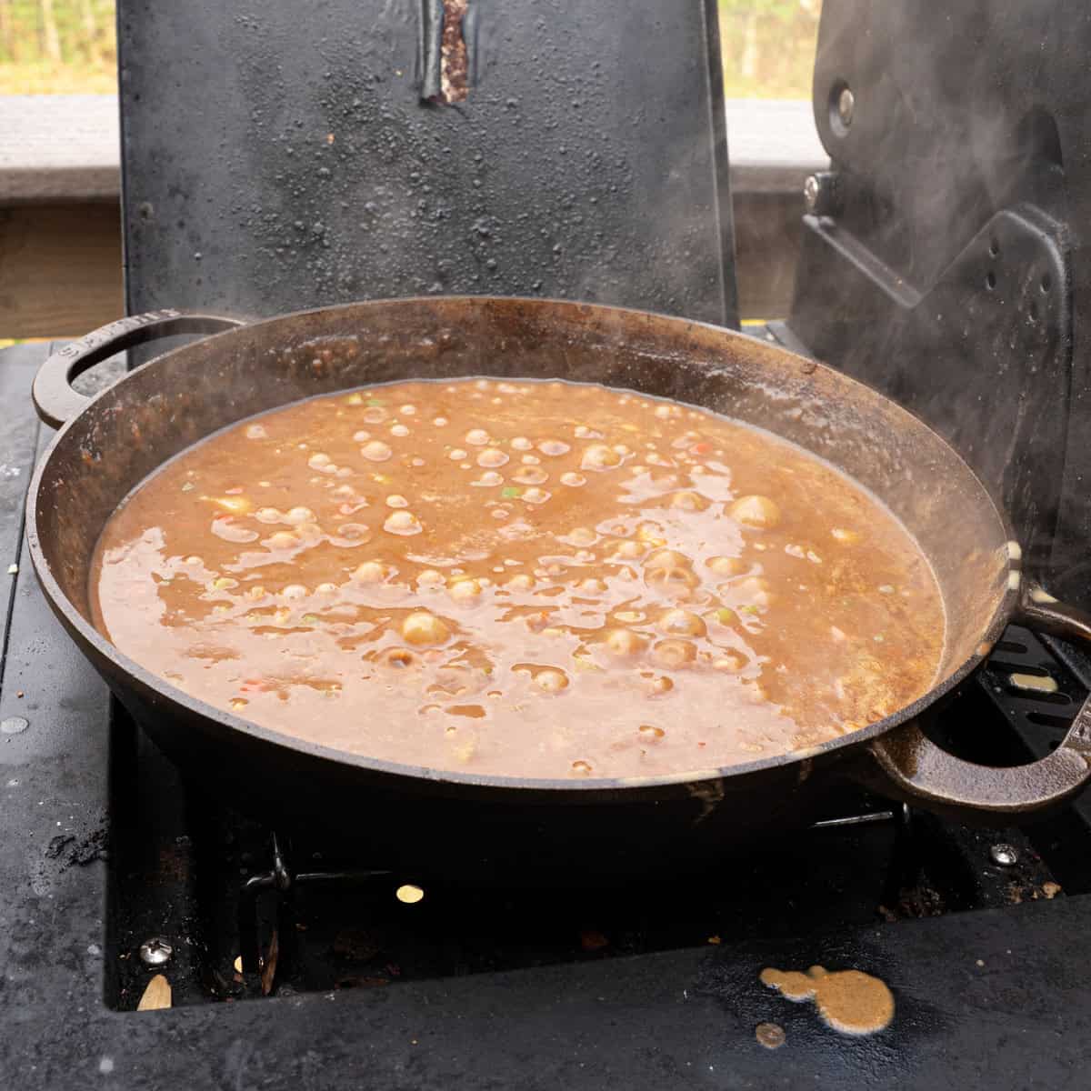 Simmering the chicken broth in with my roux for crawfish etouffee