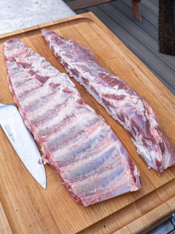 Rib tips separated from rack of spare ribs but not yet trimmed