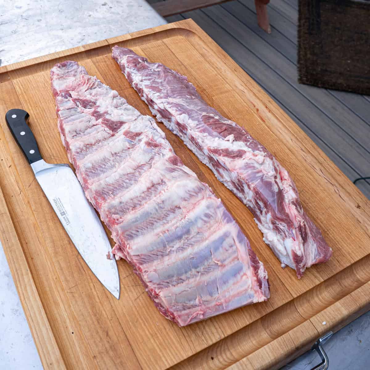 Rib tips separated from rack of spare ribs but not yet trimmed