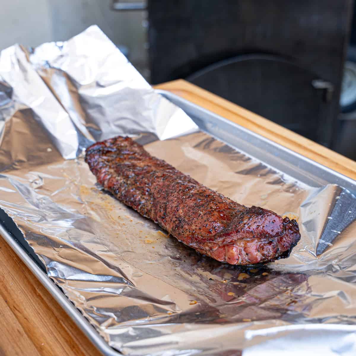 Rib tips being wrapped for the final stage of cooking
