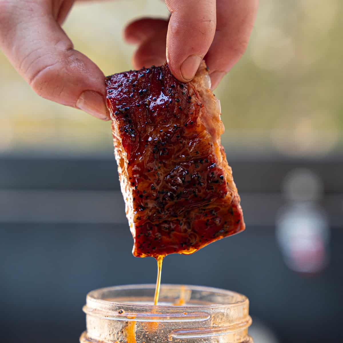 Direct Heat Rib Tips dipped in mop sauce