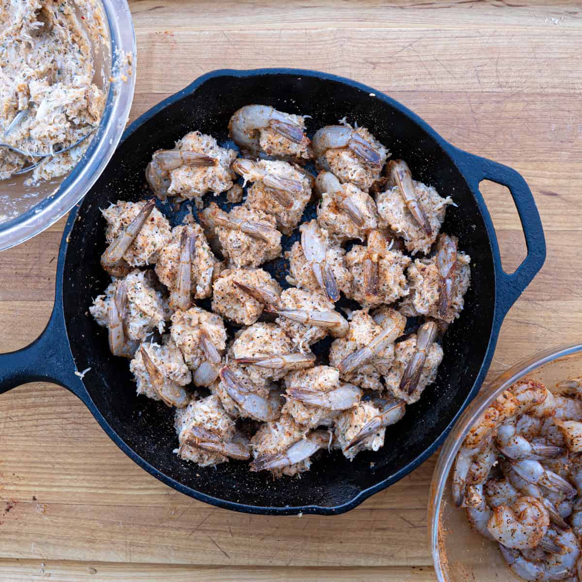 Crab stuffed shrimp prepared and sitting in a skillet