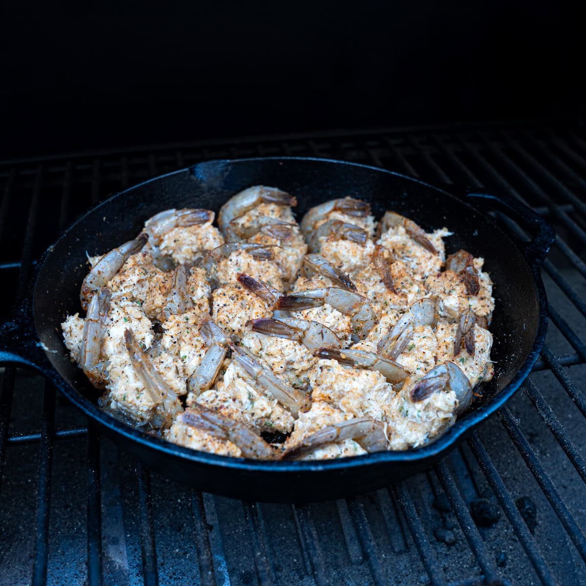 Crab stuffed shrimp placed on the smoker