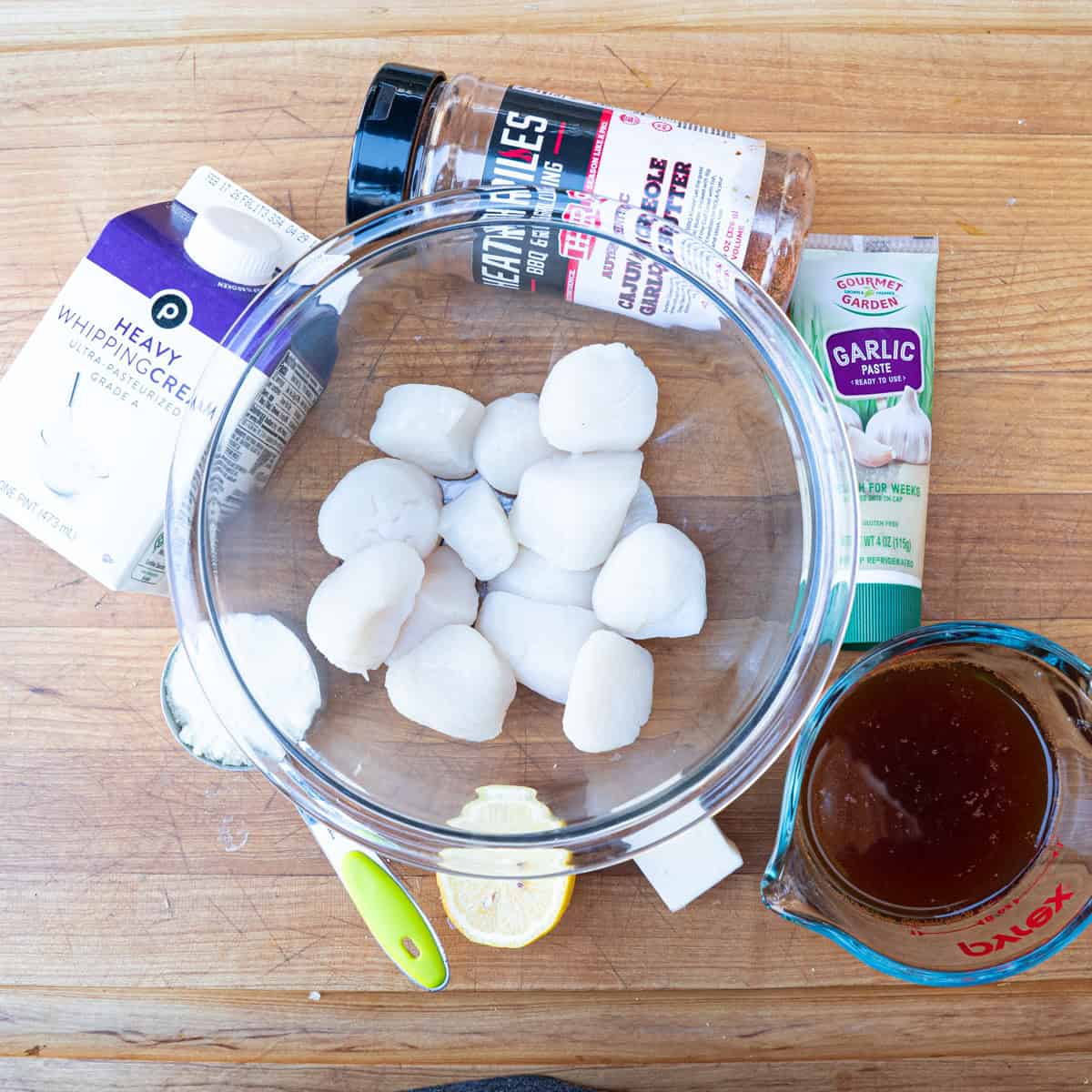 Gathering ingredients for blackened scallops and cajun cream sauce