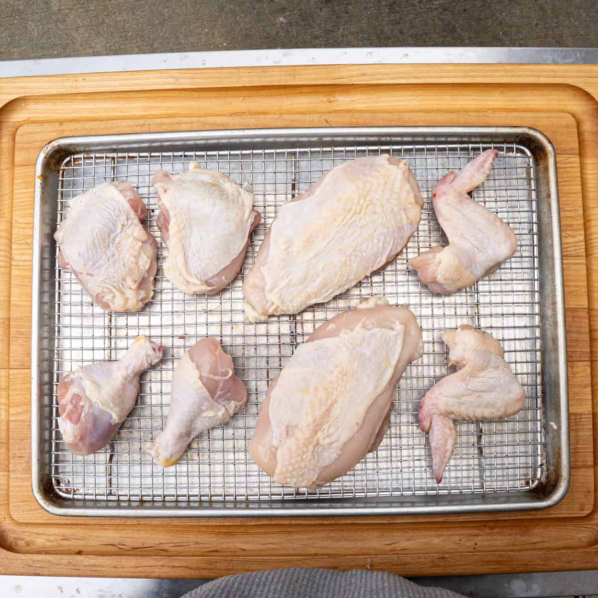 A whole chicken cut into pieces