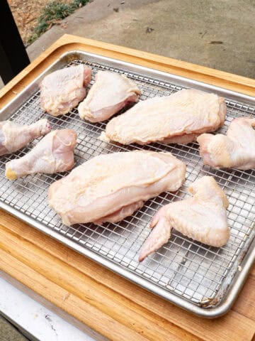 A whole chicken cut into pieces