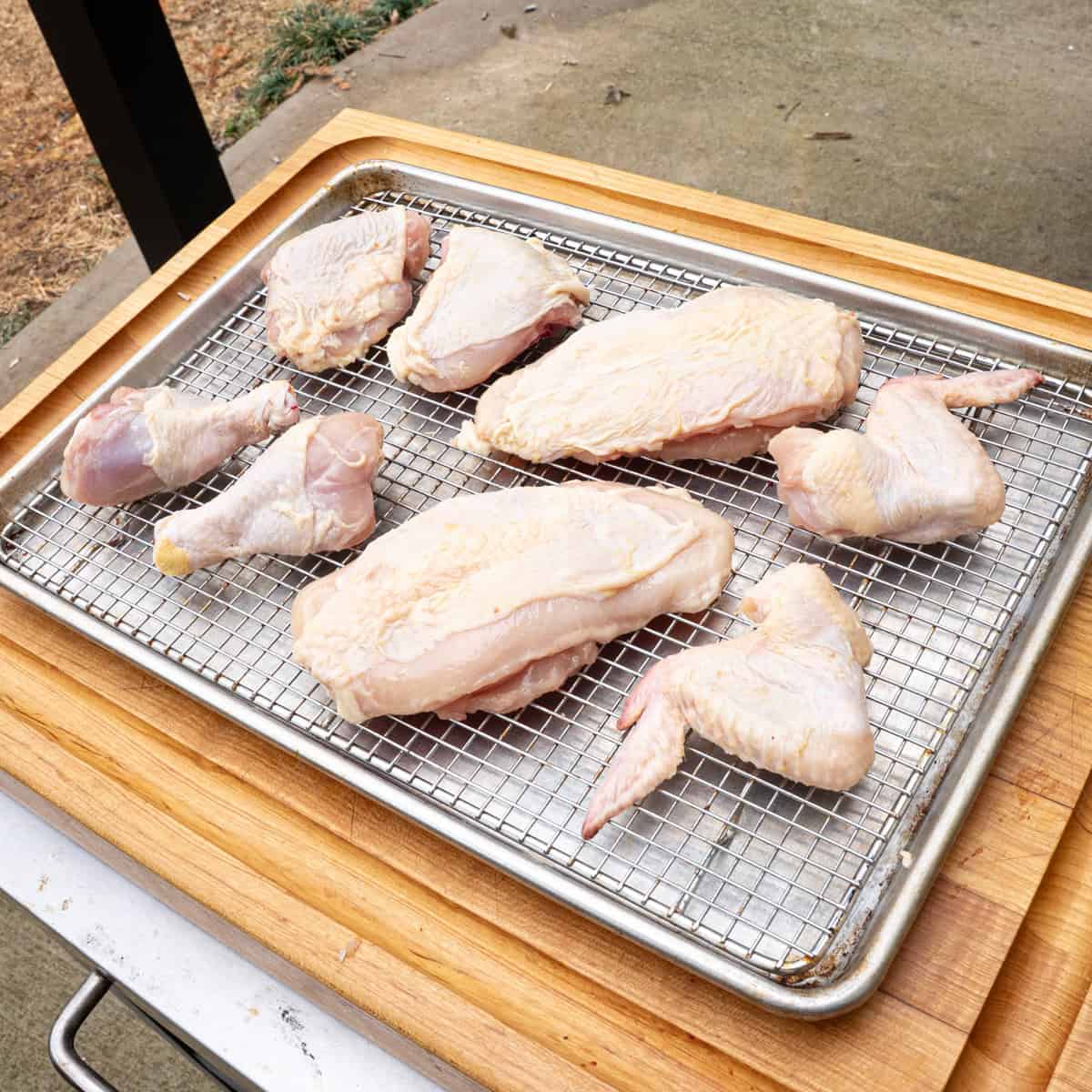 A whole chicken cut into pieces
