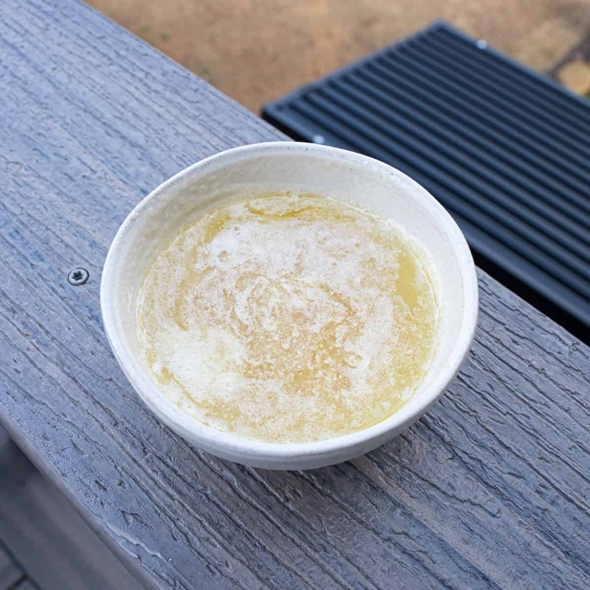 Honey and melted butter mixed so it can be brushed onto biscuits