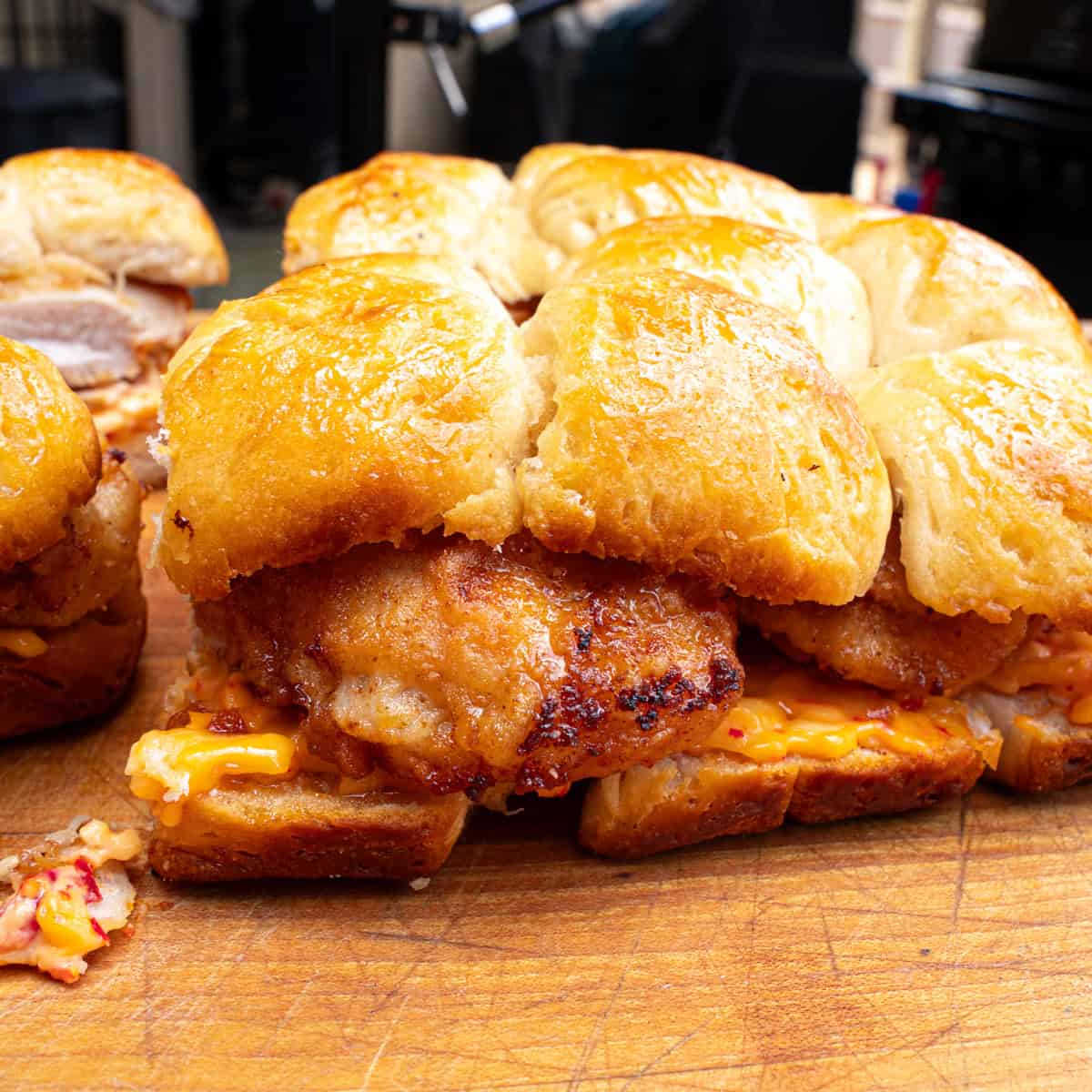 Final shot of the honey butter chicken biscuit sliders with pimento cheese