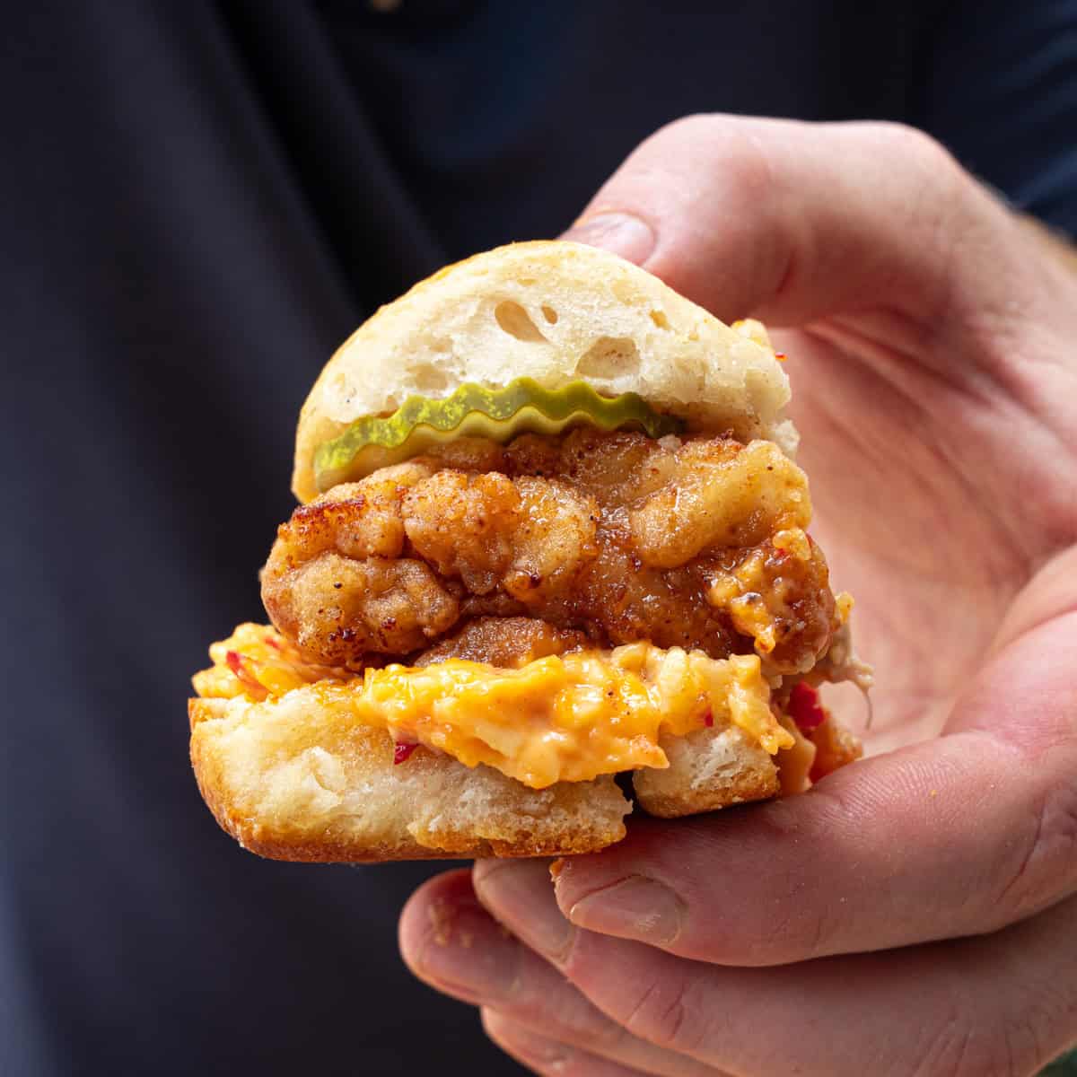 Final shot of the honey butter chicken biscuit sliders with pimento cheese
