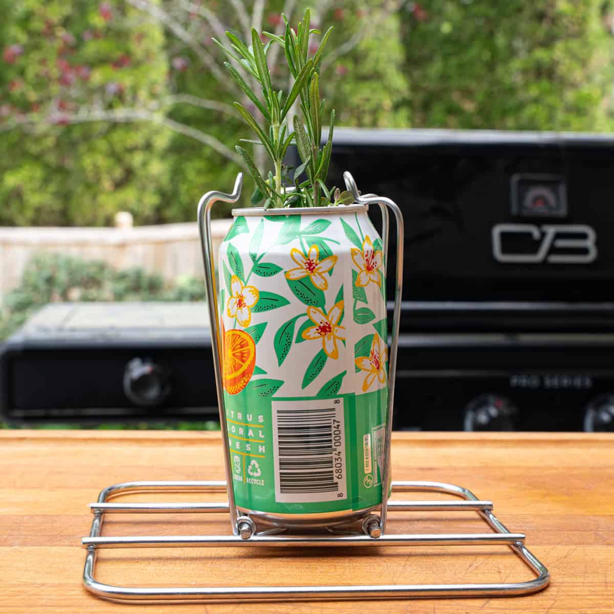 Beer can with herbs placed in it for the beer can chicken