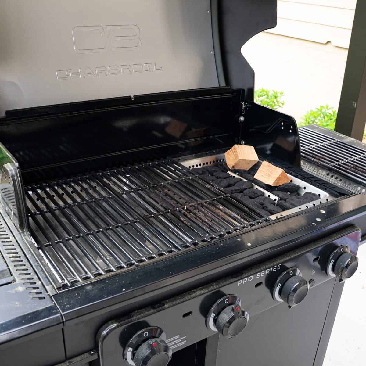 Setting up the CharBroil Pro Series Gas Grill for smoking a chicken