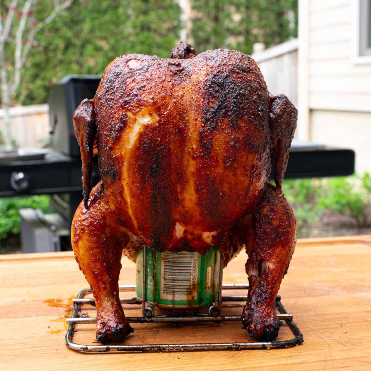 Final shot of a smoked beer can chicken with BBQ sauce