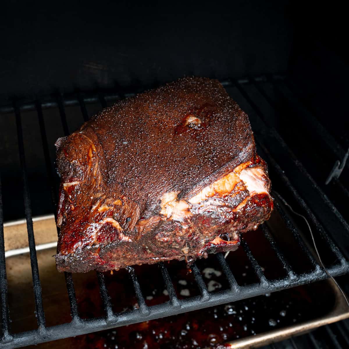 Pork butt after several hours on the smoker but before being wrapped