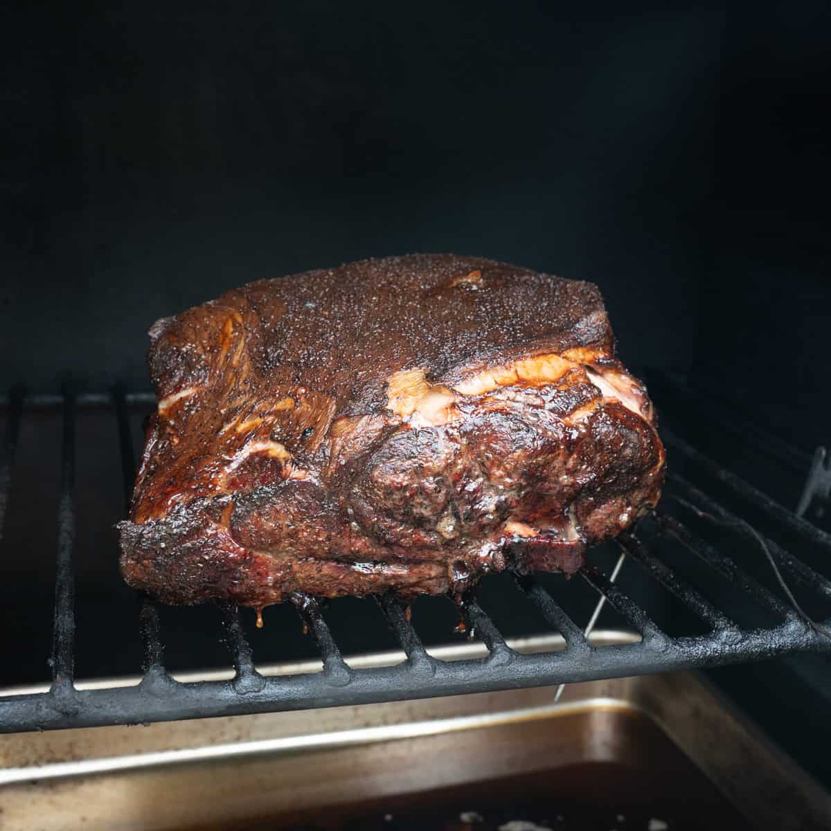 Pork butt after several hours on the smoker but before being wrapped